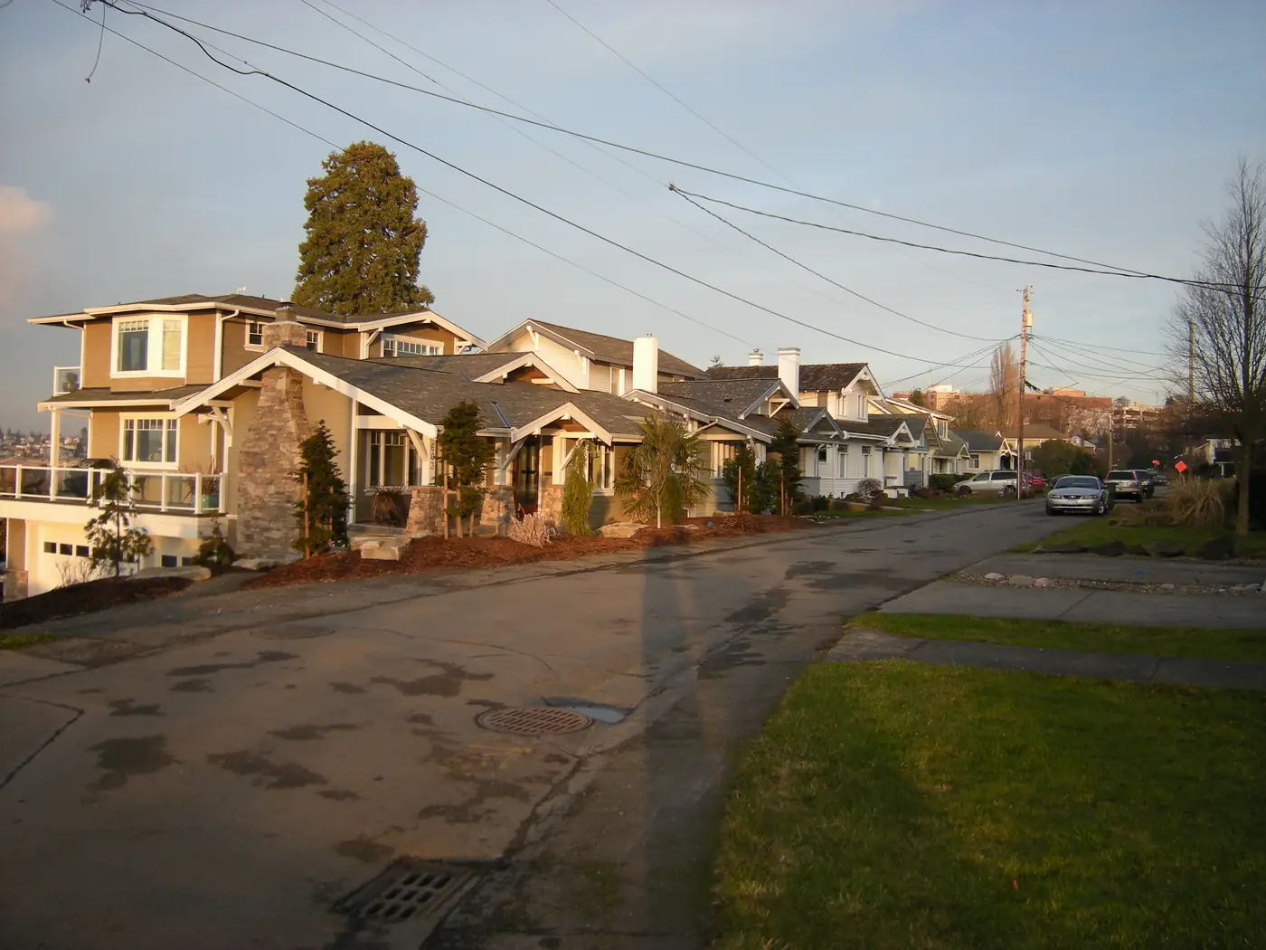 Craftsman-style houses along a residential street in Everett's Rucker Hill neighborhood in evening light